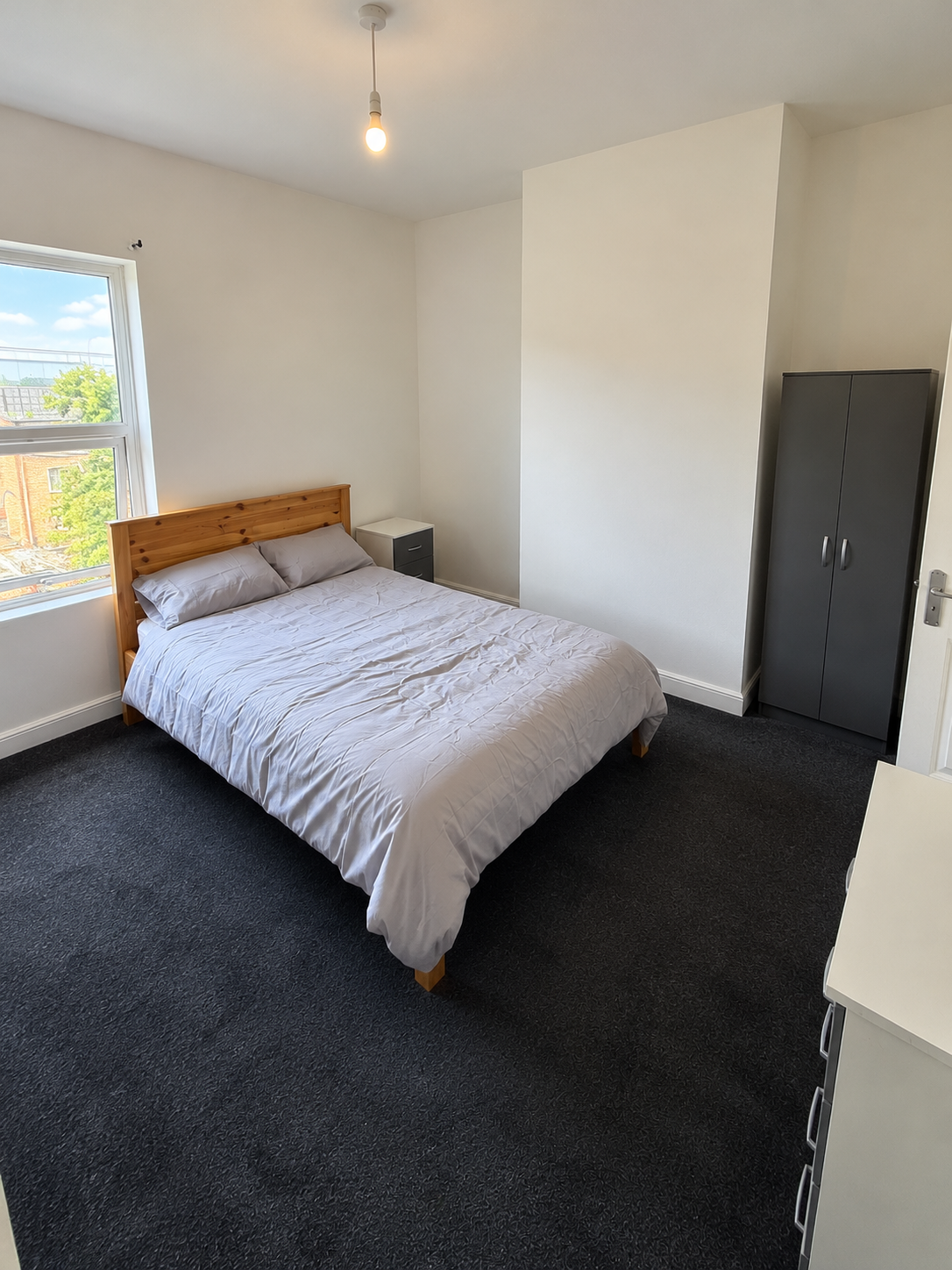 Henswood – Room 2: second view of the double bed and wardrobe